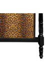 Barokkityylinen sängynpääty leopardikuvioisella kankaalla ja mustalla puulla