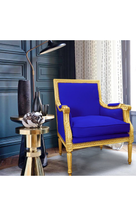 Silla grande Bergère Louis XVI estilo terciopelo azul y madera dorada