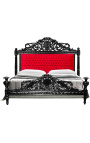 Barokk ágy vörös bársony anyaggal és feketére lakkozott fával.