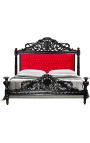 Baroque bed with red velvet fabric and black lacquered wood.