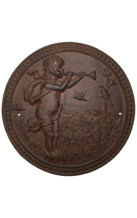 Wall decorative plate cast iron "The cherub hunting"
