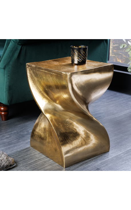 Mesa lateral em aço dourado com efeito torcido