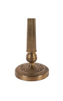 Large patinated gilt bronze candlestick