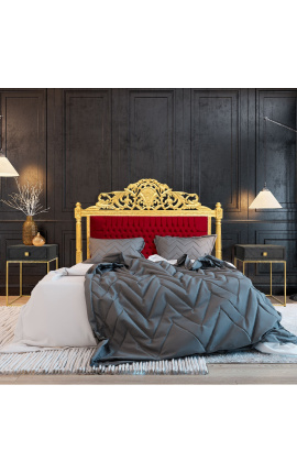 Barokkityylinen sängynpääty viininpunaista samettia ja kultapuuta