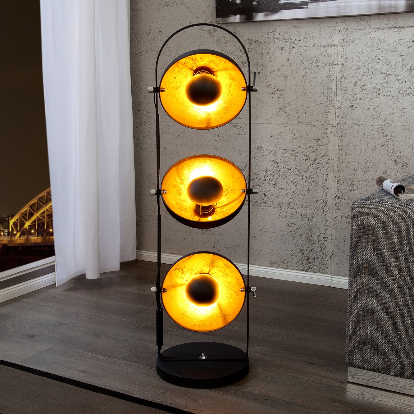 Studio style lamp with adjustable black and gold spots