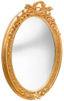 Very large golden vertical oval baroque mirror