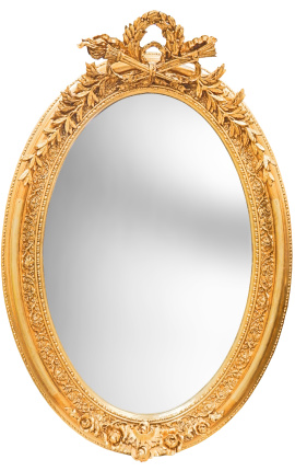 Very large golden vertical oval baroque mirror