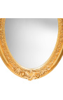 Very large golden vertical oval baroque mirror