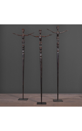 Wooden fetish from Borneo on metal stand