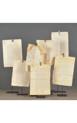 Set of 7 old letters presented on a metal base