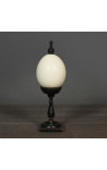 Ostrich egg on wooden baluster with square base