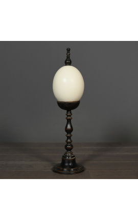 Ostrich egg on wooden large baluster with round base