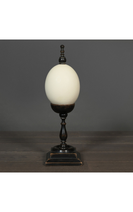 Ostrich egg on wooden large baluster with square base