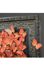 19th century black patinated style frame with flight of orange butterflies