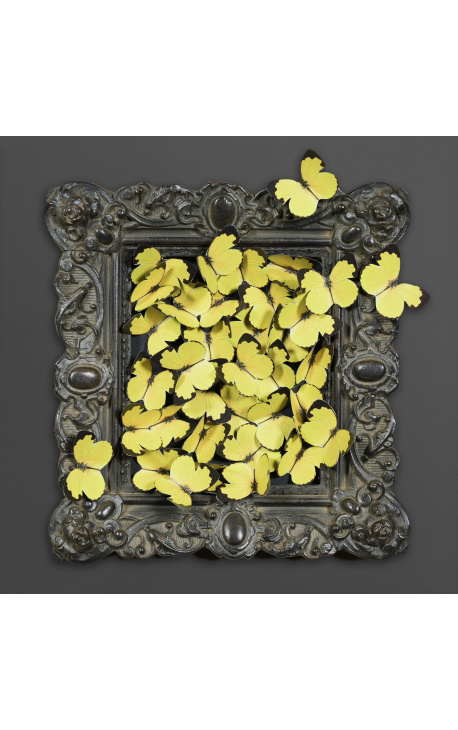 19th century black patinated style frame with flight of yellow butterflies