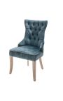 Conjunt de 2 cadires en vellut blau de gasolina i fusta natural amb anell a la part posterior