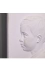 Pair of plaster child profile to be attached to the wall - negative and positive