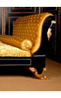 Bett im Empire-Stil mit satingoldenem Stoff und schwarz lackiertem Holz