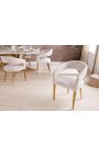 Een paar CALYPSO eetstoelen in gestructureerd beige fluweel met gouden benen