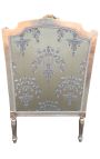 Grande bergère de style Louis XVI tissu satiné doré avec motifs et bois doré