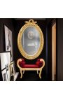 Very large golden vertical oval baroque mirror