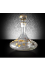 Decanter engraved with floral motives in gold