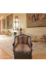 Bergere lenestol i Louis XV-stil med leopardstoff og blankt svart tre