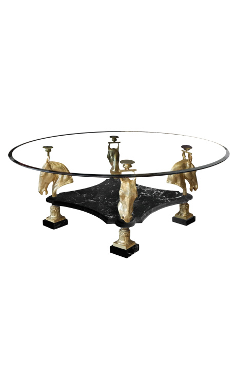 Round dining table with bronze decorations horses and black marble