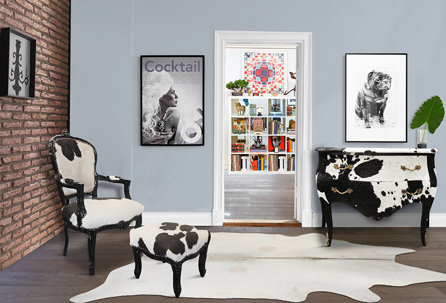 scene with a carpet, a chair, a footrest and a dresser cowhide