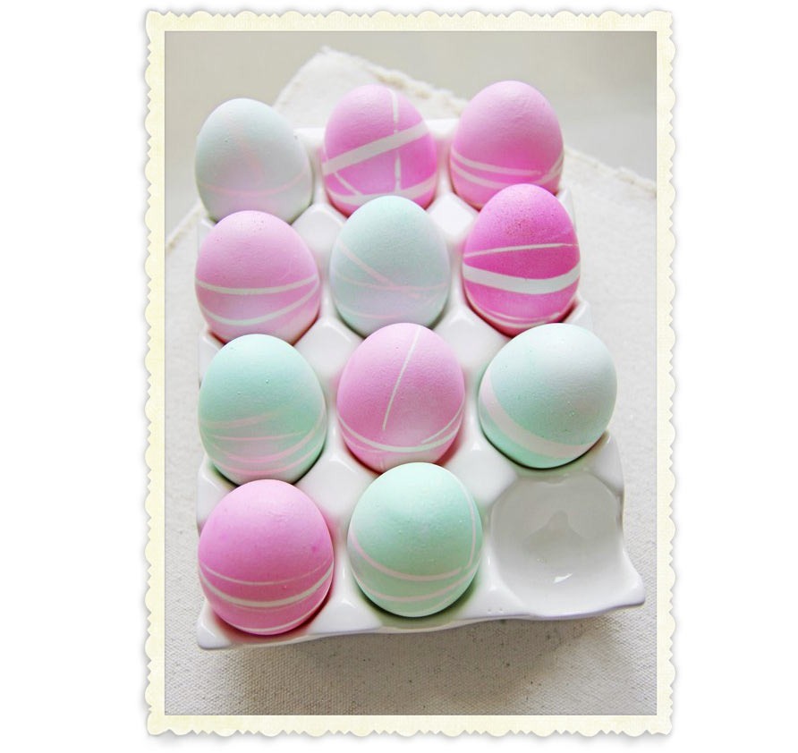 DIY Easter egg in pastel colors decorated with masking tape and paint