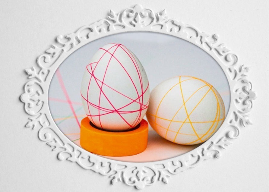 DIY Easter egg decorated with thin strips of masking tape